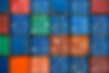 Four vertical rows of shipping containers